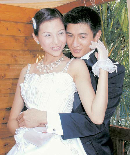悉数港台老帅哥迎娶内地年轻女星[图]